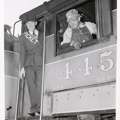 [Picket Walter Lindley informing Southern Pacific engineer George Karmen about imminent strike]