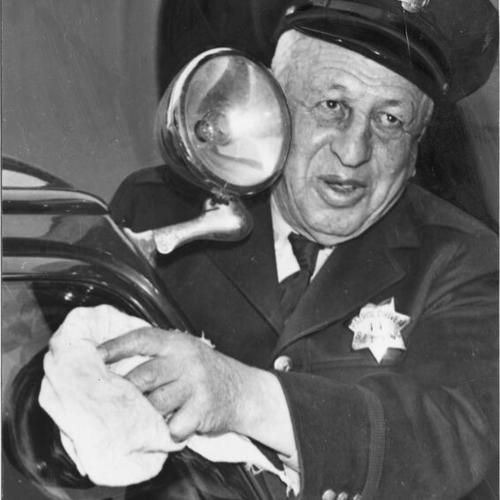 [Officer Louis Holz, oldest patrol wagon driver in service]