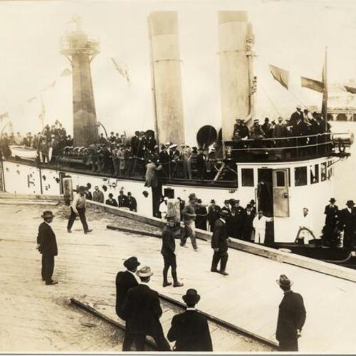 [Boat docking at pier during Fire Department exhibition at the Panama-Pacific International Exposition]