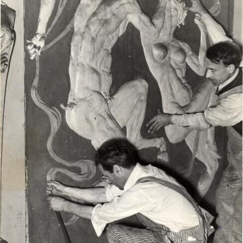 [John Casada and Jos. Farnocchia removing panels from old Hippodrome nightclub]