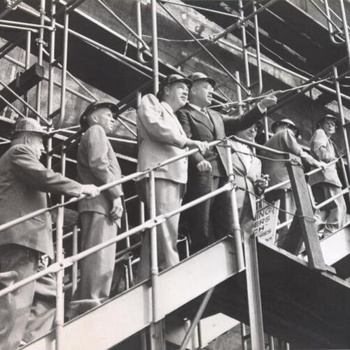 [U. S. Representative Thor Tollefson and others during a tour of the Bethlehem Pacific Shipyard]