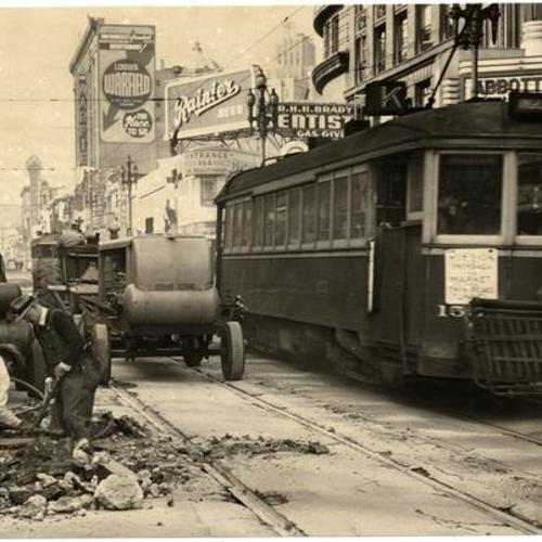[Workmen ripping up the pavement on Market Street]