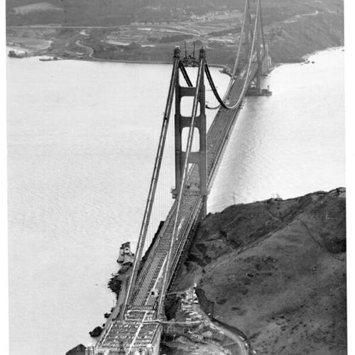 [Aerial view of Golden Gate Bridge deck under construction]