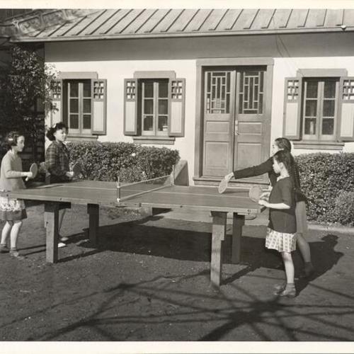 [Children playing ping pong at the San Francisco Recreation Center in Chinatown]