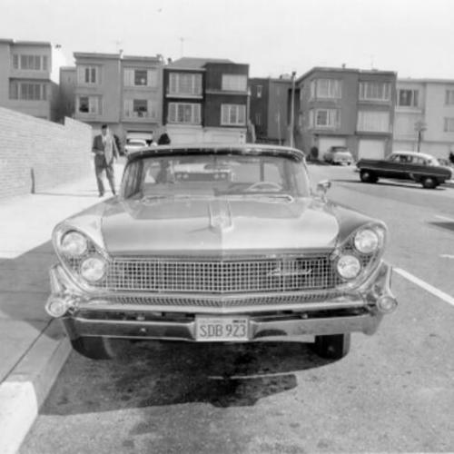 [Frontal view of a parked car at 448 - Laurel at Mayfair street]