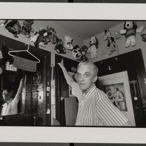 David "Grannie" Matthias points to stuffed animals on his walls that represent friends and patients who have contracted or died from AIDS
