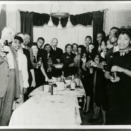 [Grandmother Estelle's birthday party at her home on O'Farrell Street in 1947 surrounded by family]