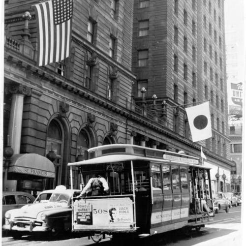 [Powell Street cable car in front of Saint Francis hotel]
