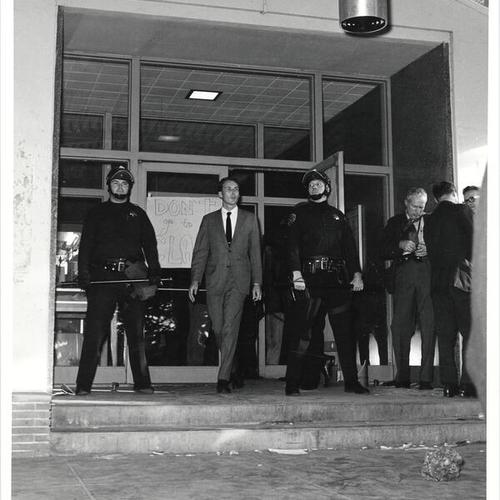 [Riot police guarding the entrance to a building at San Francisco State College]