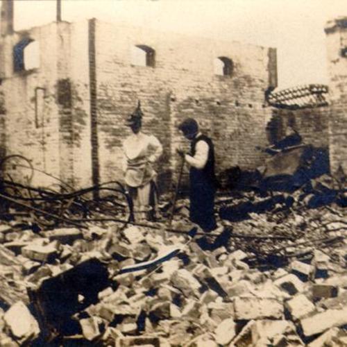 [Ethel Beaver standing amidst the ruins of her home at 1300 Taylor Street after the earthquake and fire of April, 1906]