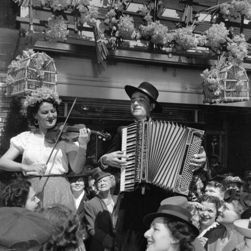 [Two musicians performing at the Maiden Lane festival]