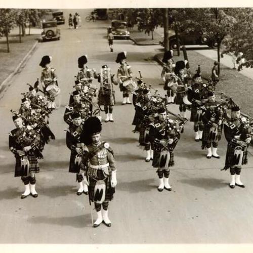 [Sixteenth Battalion Canadian Scottish Regiment marching in the Golden Gate Bridge Fiesta Parade]