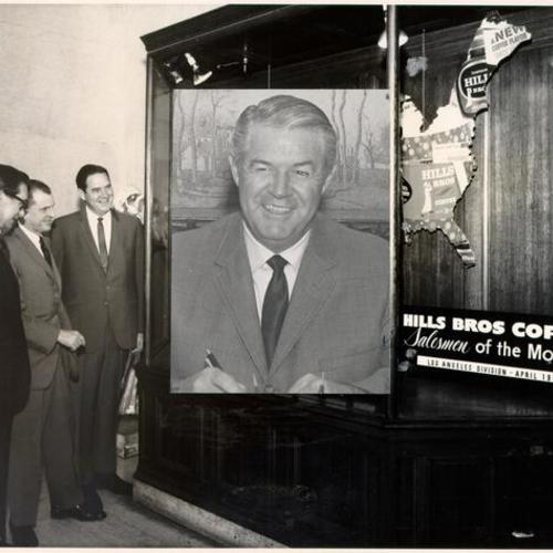 [Paul J. Cohrt, manager of the Los Angeles Division of Hills Brothers Coffee, being honored as salesman of the month]