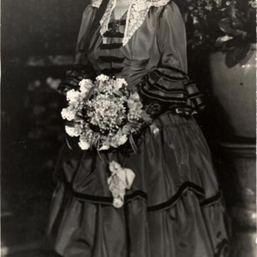 [Mrs. James C. Flood as "Belle of the Fifties"]