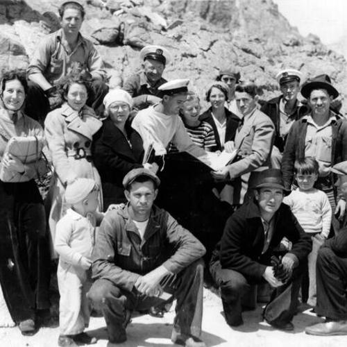 [Census taker Edward M. Gaffney posing for a photograph with a group of people on the Farallon Islands]
