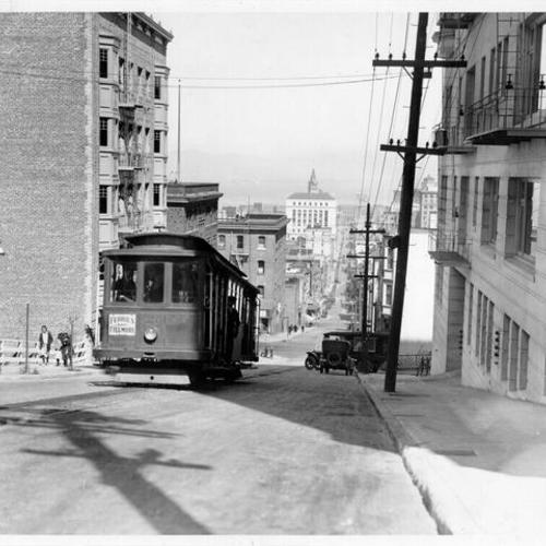[Powell Street cable car on Sacramento Street near Mason]