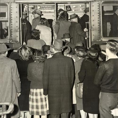[Passengers boarding a Key System train at First and Mission streets terminal]