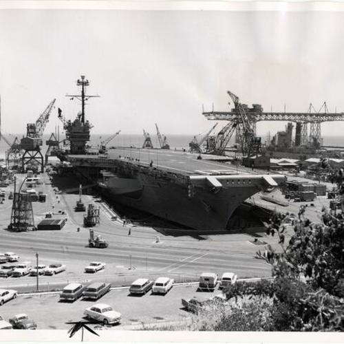 [Aircraft carrier being repaired at Hunters Point Naval Shipyard]