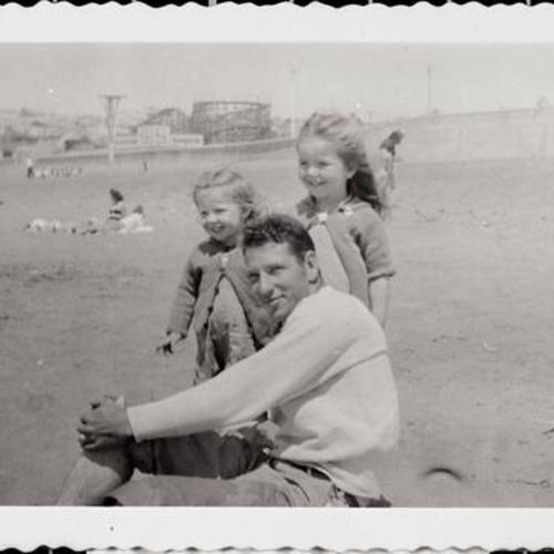 [Charlie with nieces Artie and Joann at Ocean Beach]