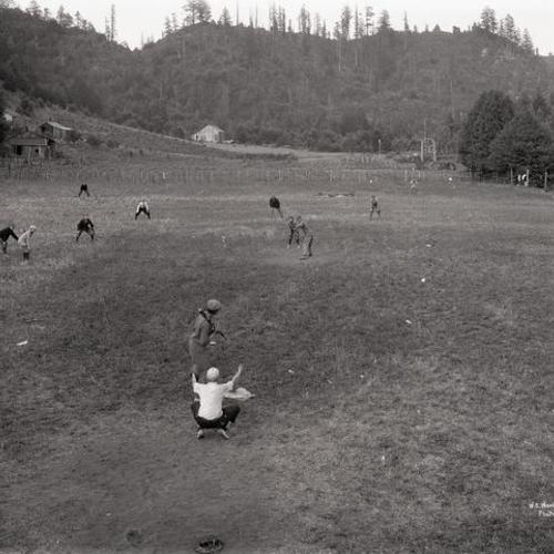 People playing baseball outside at Camp McCoy