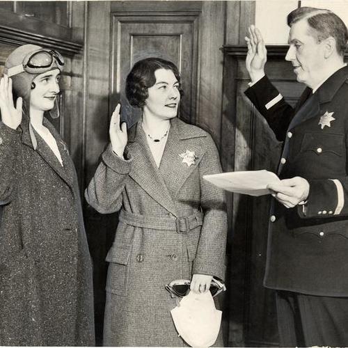 [Police Chief William Quinn with Marjorie Hook and Maude Miller]