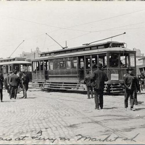 [Trolley cars parked in front of the Ferry Building]
