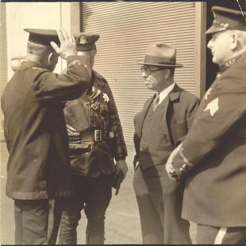 [Police officers and Hugh Gallagher at Pier 32 during strike of 1934]