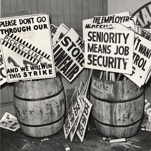 [Signs used by striking department store employees]