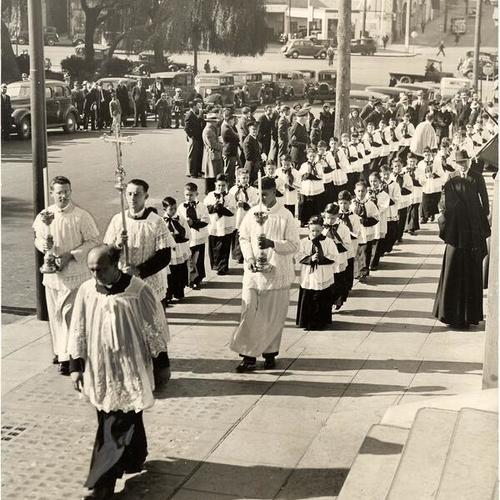 [John J. Mitty presiding over high mass ceremonies outside of Saints Peter and Paul's Church]