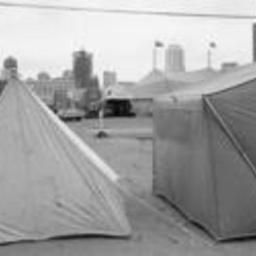 [Tenants and Owners in Opposition to Redevelopment tents at a demolition site, 