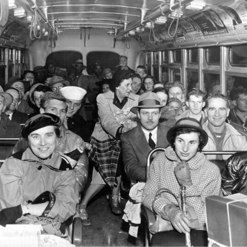 [Passengers photographed in a Greyhound bus during closing of Golden Gate Bridge]