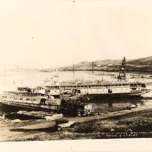 [Riverboats "Modoc" and "Apache" sitting in boneyard]