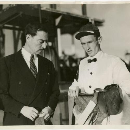 Buster Keaton (left) with person in hat