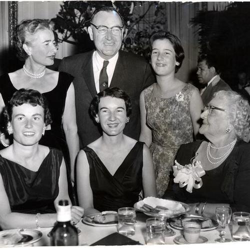 [Edmund G. Brown posing with his family at a dinner in the Fairmont Hotel]
