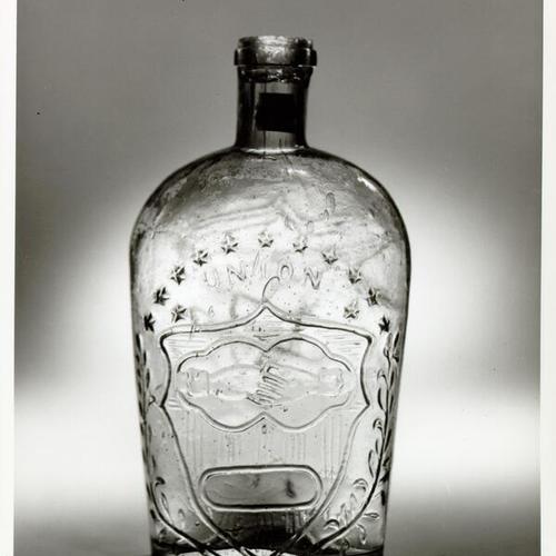 [Antique bottle with the word "union" on it from Walter Landor Associates museum]