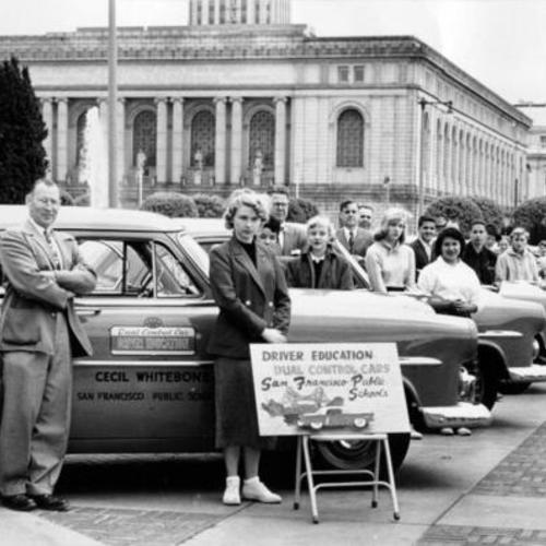 [High School seniors line up at Civic Center for Driver Education training]