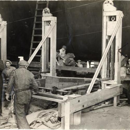 [Guillotines being set-up for launching of ship "American Leader"]