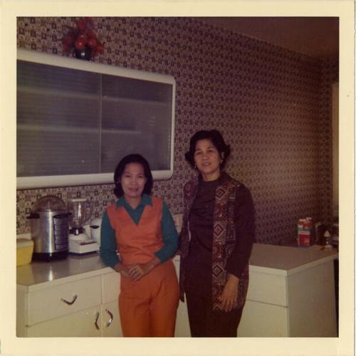 [Bernadette's grandmother Leonila and friend at home]
