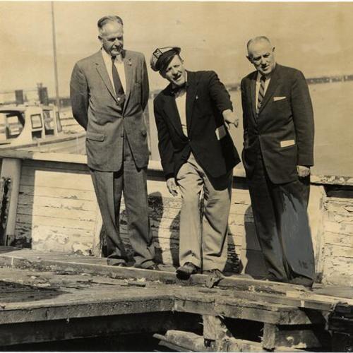 [Barney Gould showing his riverboat "Fort Sutter" to L. J. Archer and Chester R. MacPhee]
