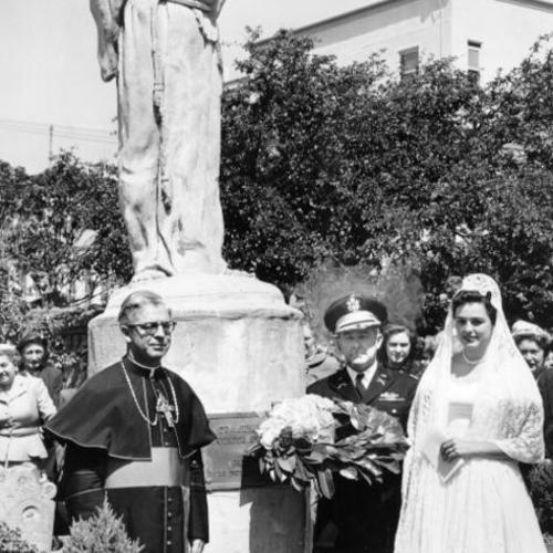 [Col. Carl Lundquist placing a wreath beneath the statue of Father Francisco Palou at Mission Dolores]