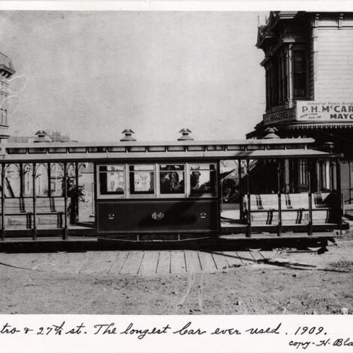 Castro & 27th st. The longest car ever used. 1909