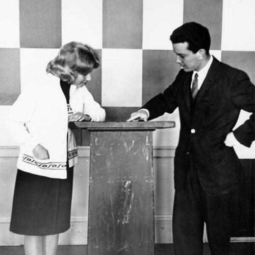 [Two students participating in a debate at Lowell High School]