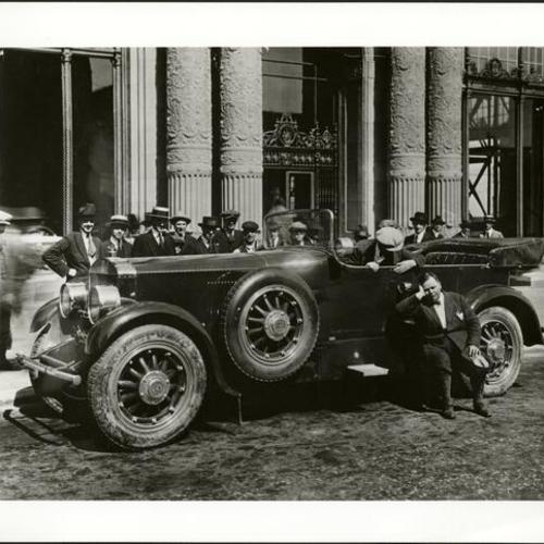 [Fatty Arbuckle with car in front of 1000 Van Ness Avenue]