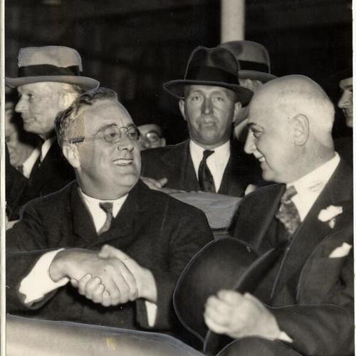 [President Franklin D. Roosevelt greeting Mayor Angelo Rossi]