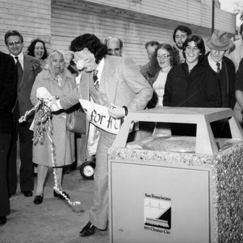 [Sir Beaky Penrose breaking a champagne bottle over Noe Valley's first trash can]