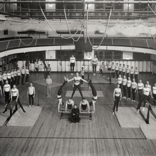 Y. M. C. A. gymnastics team portrait in gymnasium