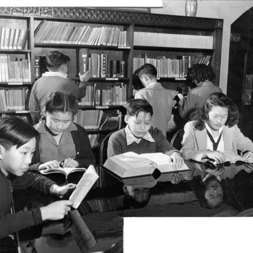 [Students studying in the library at St. Mary's Chinese School]