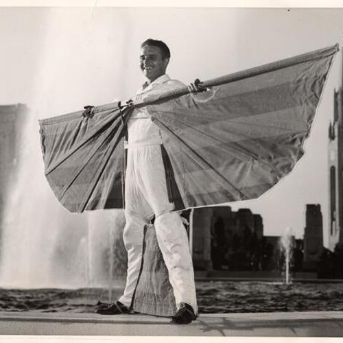 [Jimmy Goodwin wearing the new wings he will use to glide down from 10,000 feet in the air, Golden Gate International Exposition on Treasure Island]