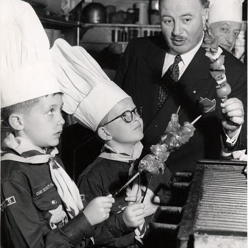 [Chef George Mardikian with Cub Scouts Gary Semereau and Walter Acker]
