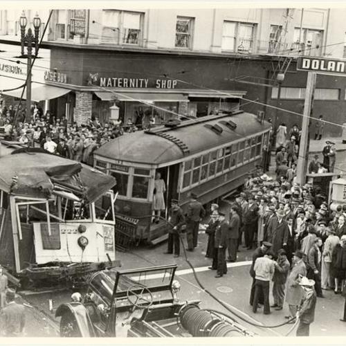 [Sutter and Stockton streets looking northwest at collision of inbound Market Street Railway #4 line car 222 and northbound Muni "F" line car 31]